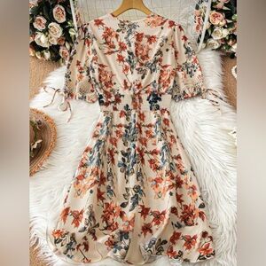Elegant Floral Midi Dress in Cream and Orange